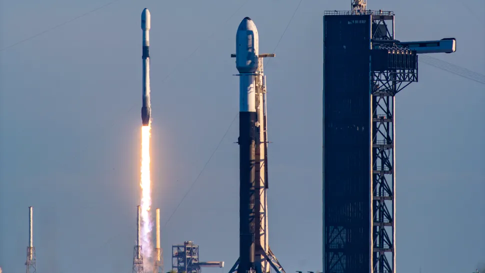 A SpaceX Falcon 9 rocket launches the USSF-124 mission for the U.S. Space Force from Cape Canaveral Space Force Station in Florida on Feb. 14, 2024. In the foreground is another Falcon 9, which launched Intuitive Machines’ Odysseus moon lander from Kennedy Space Center that same day. (Image credit: SpaceX via X)